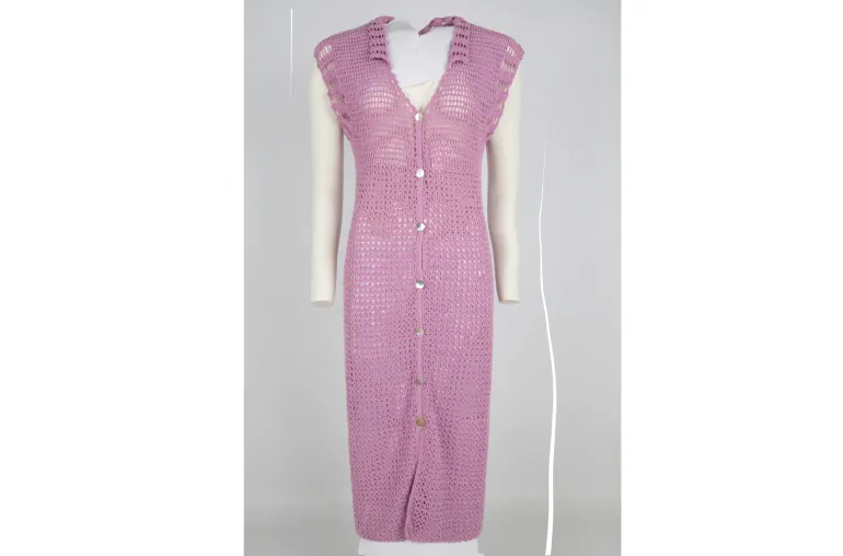 A knitted dress on a mannequin and stand
