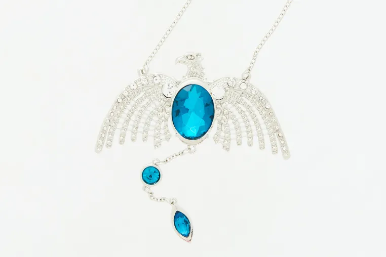 A silver necklace with blue stones